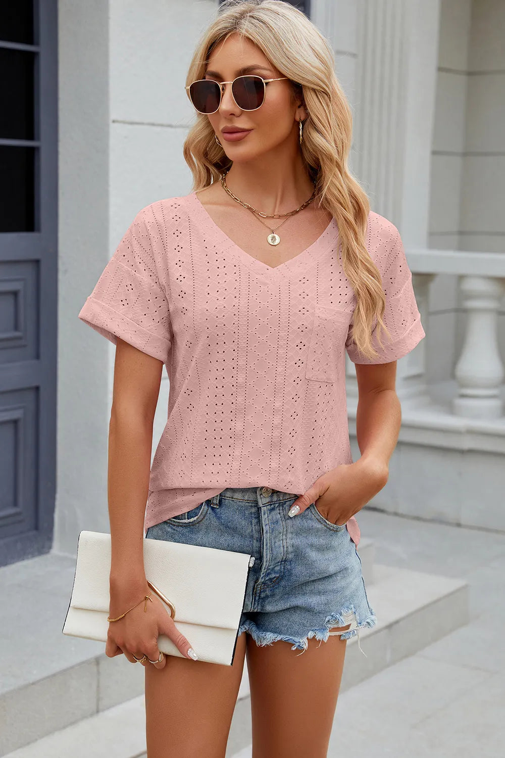 Solid color pocket V-neck loose short sleeved T-shirt top for women
