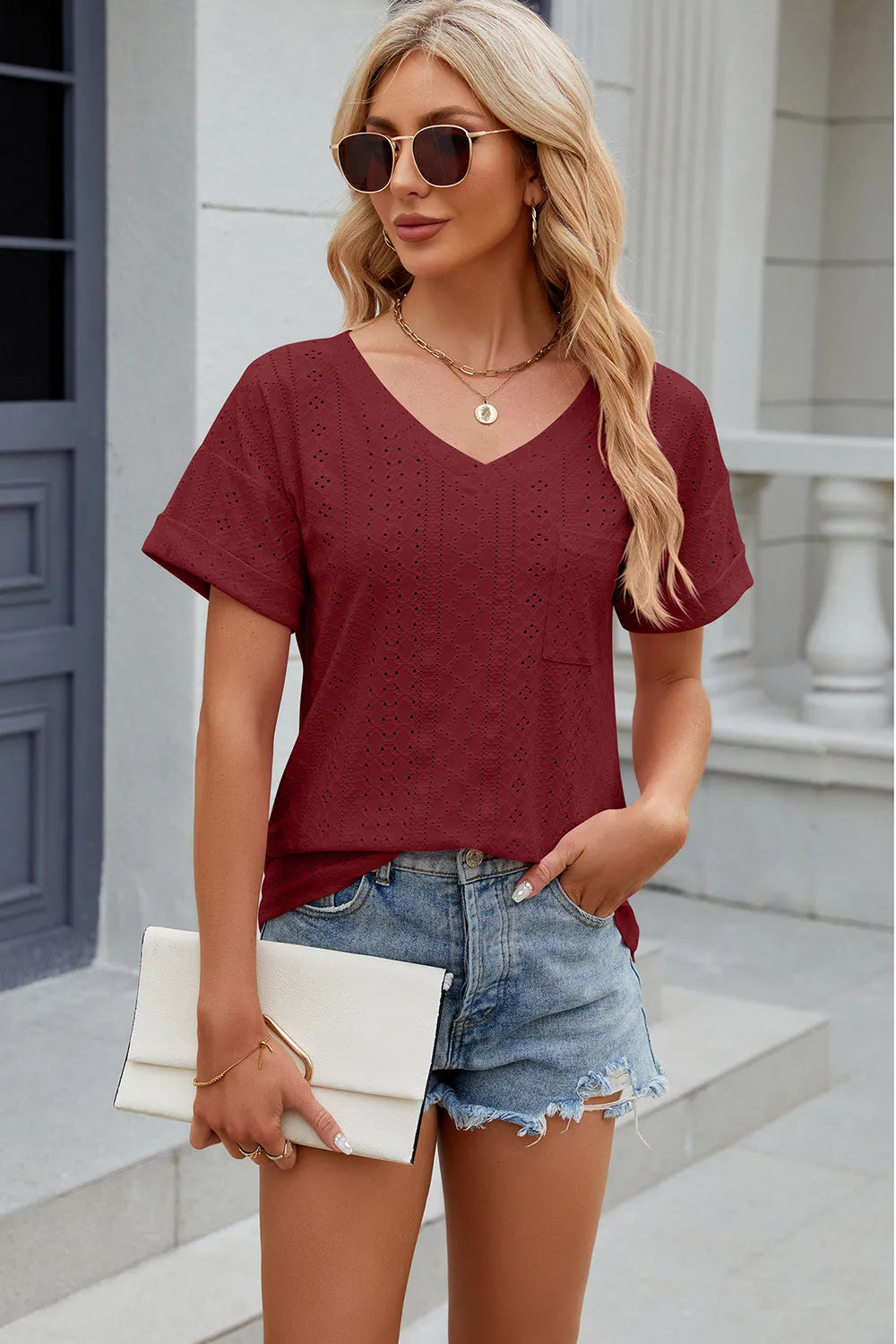 Solid color pocket V-neck loose short sleeved T-shirt top for women