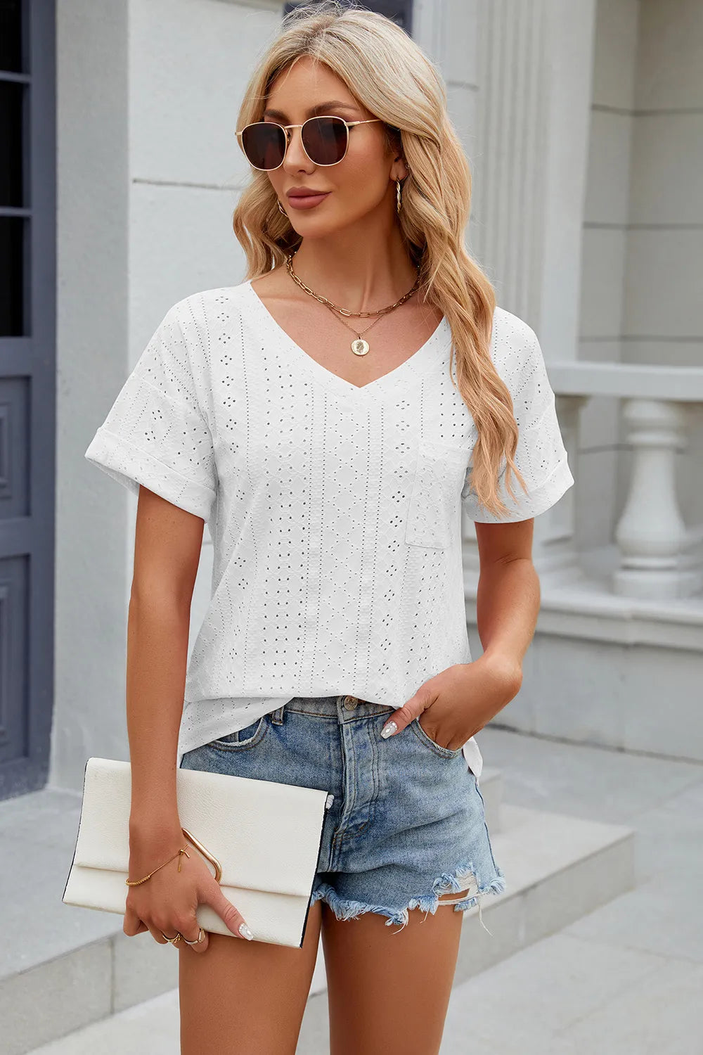 Solid color pocket V-neck loose short sleeved T-shirt top for women