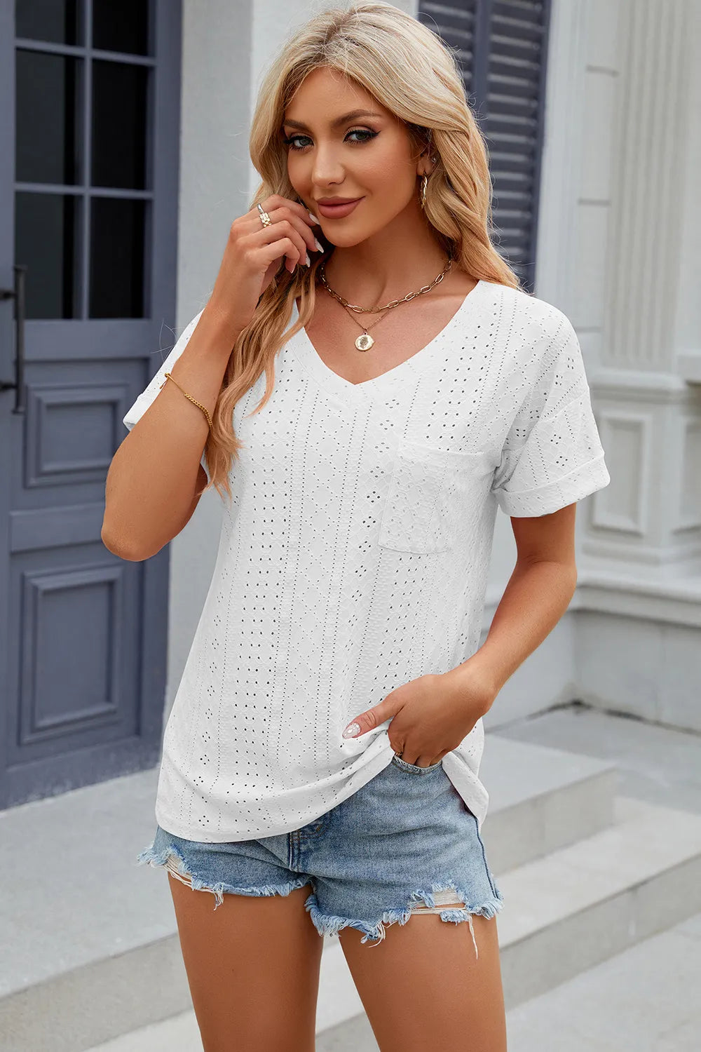 Solid color pocket V-neck loose short sleeved T-shirt top for women