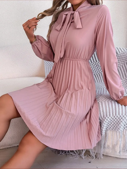 Spring and summer temperament tied waist long sleeved pleated skirt